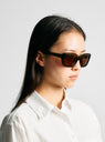 Junior Sunglasses Lost Woods Green by Sun Buddies | Couverture & The Garbstore Model Shot