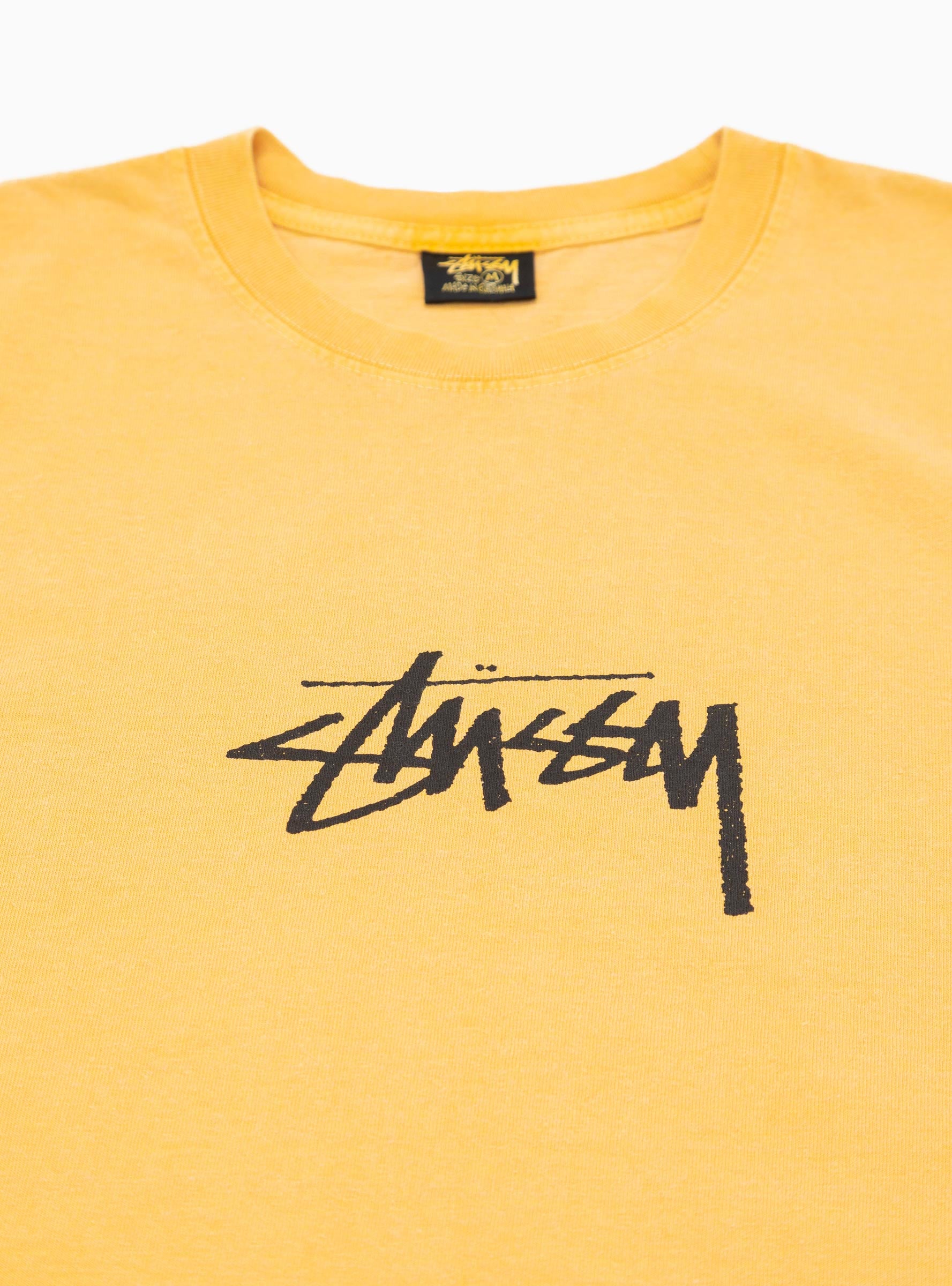 Stussy yellow discount t shirt