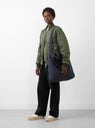 Tote Bag Navy by YMC at Couverture and The Garbstore reverse on model