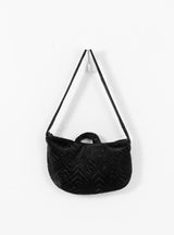 Small Echo Bag Black by Mina Perhonen on model at Couverture and The Garbstore on peg