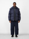 Tech Alpine Down Parka Navy by Daiwa Pier39 at Couverture and The Garbstore on model 