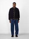 Two Tuck Wide Tapered Pants Blue Denim by Farah Japan at Couverture and The Garbstore on model