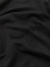 Wordmark Pigment Dyed T-Shirt Black by Museum of Peace and Quiet at Couverture and The Garbstore close up 