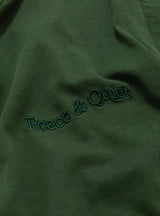 Wordmark Pigment Dyed T-Shirt Forest by Museum of Peace and Quiet at Couverture and The Garbstore chest logo 