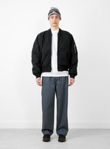 Quilted Bomber Waxed Black by Stussy at Couverture and The Garbstore on model 