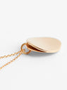 Double Layer Round Pendant Gold Plated from Helena Rohner at Couverture & The Garbstore
Close-up