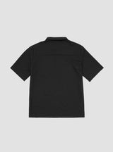 Cosmo Tech Polo Shirt True Black by HOUDINI | Couverture & The Garbstore